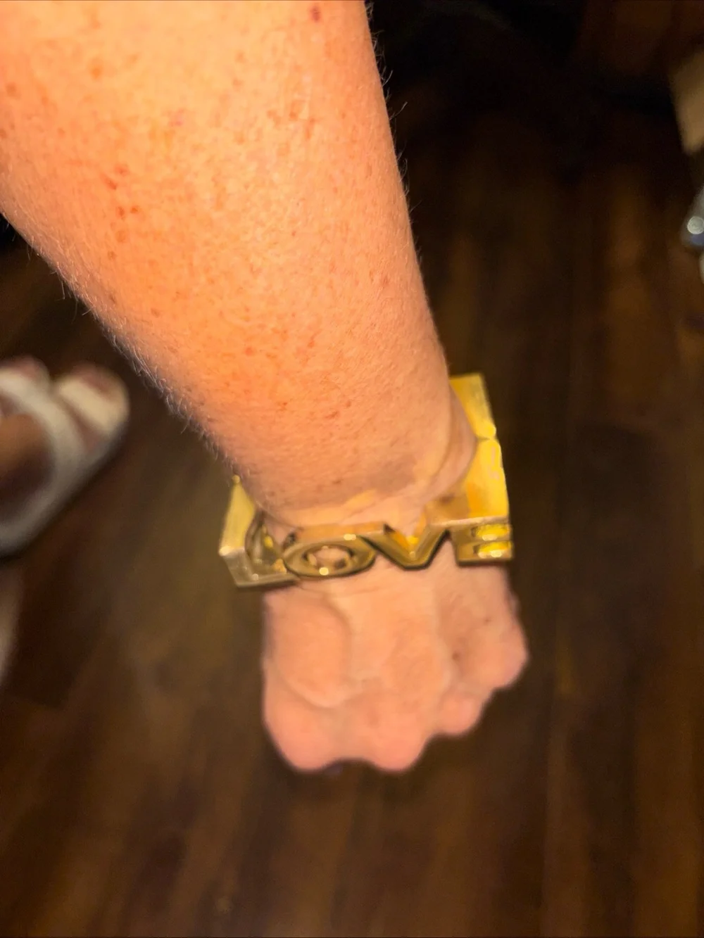 Gold Toned Brass “Love” Bangle Bracelet